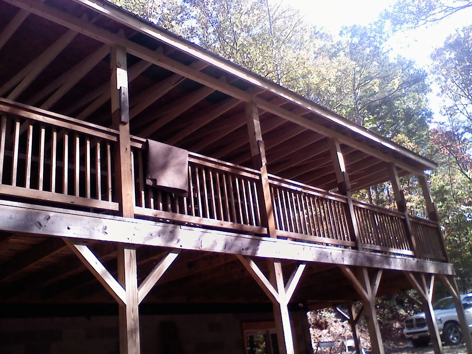 Timber framing under a new elevated porch and deck — Roof Leak Repair in Phil Campbell by Roofing Brothers